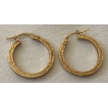 A pair of 9ct gold hoop earrings.