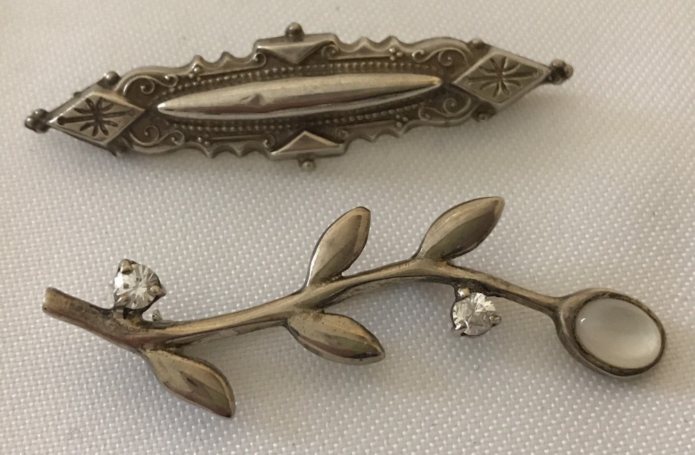 2 vintage hallmarked silver brooches.