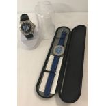 A Stade de France souvenir watch by LMC with blue leather strap, in original presentation box.