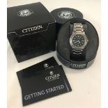 A men's boxed Citizen Eco-Drive titanium strap analogue wristwatch.