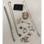 A small collection of silver, white metal and costumes jewellery.