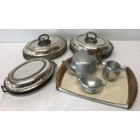 A collection of silver plated serving tureens some by Walker & Hall.