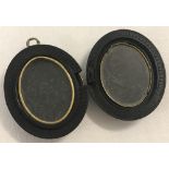 An antique bog oak mourning locket.