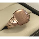 A gent's 9ct rose gold signet ring.