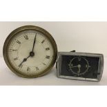 A German VDO Kienzle vintage car clock together with a brass cased clock.