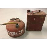 2 vintage petrol cans. 1 by Eagle and complete with feeding pipe.