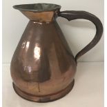 A large 2 gallon copper ale measure Harvest jug.