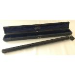 A cased vertical Giorgi flute by Joseph Wallis & Son Limited, London N.W.