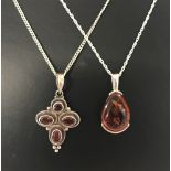 A silver teardrop style pendant set with amber on a 18 " Singapore style chain.