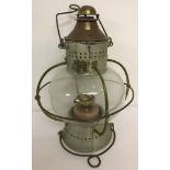 A large Wm. Harvie & Co, Birmingham, marine onion-shaped brass and copper oil lamp.