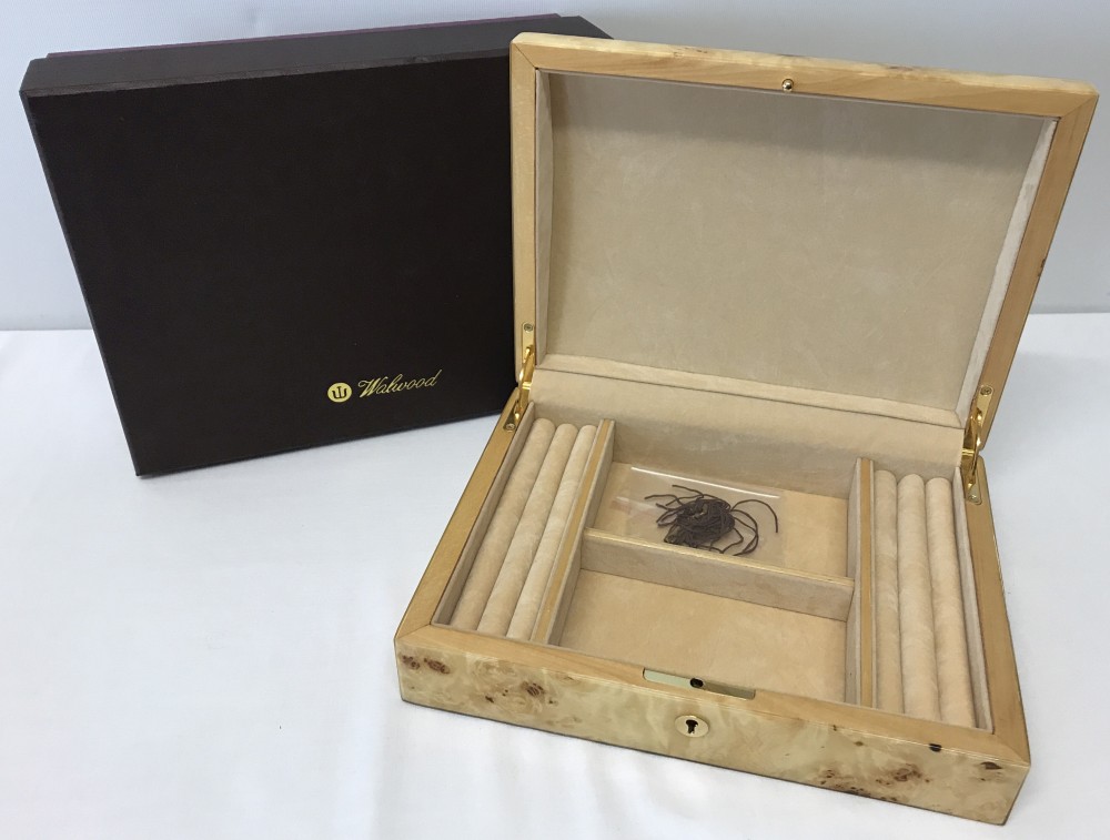 A boxed Birdseye maple jewellery box by Walwood.