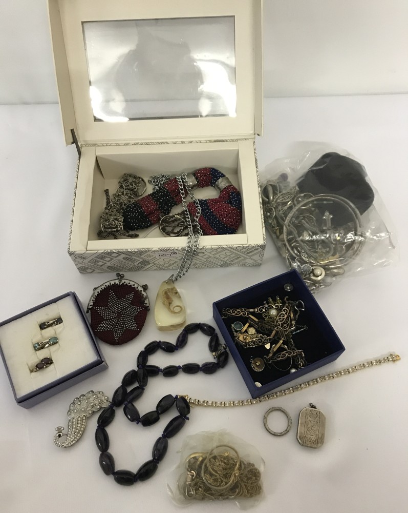 A collection of vintage and modern costumes jewellery.