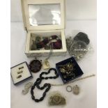 A collection of vintage and modern costumes jewellery.