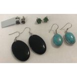 4 pairs of silver and semi precious stone earrings.