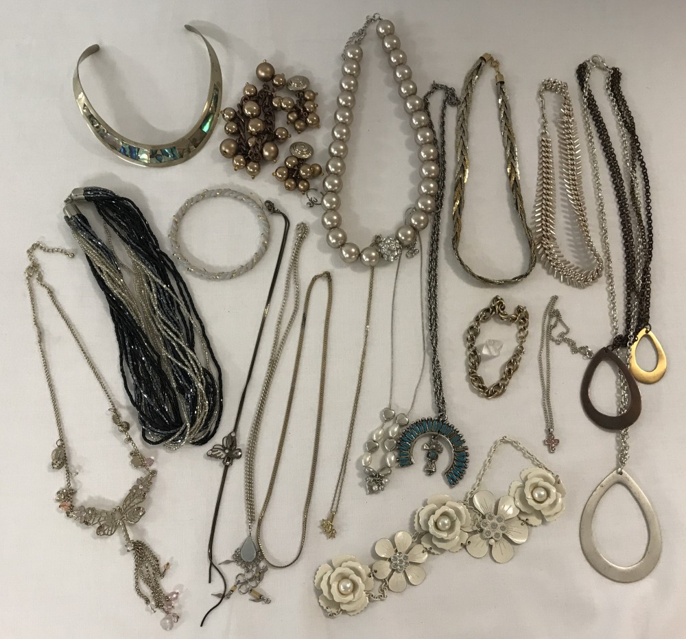 A small collection of vintage and modern costume jewellery.