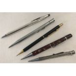 A collection of 5 propelling pencils. To include sterling silver, Hugo Boss and Platignum.