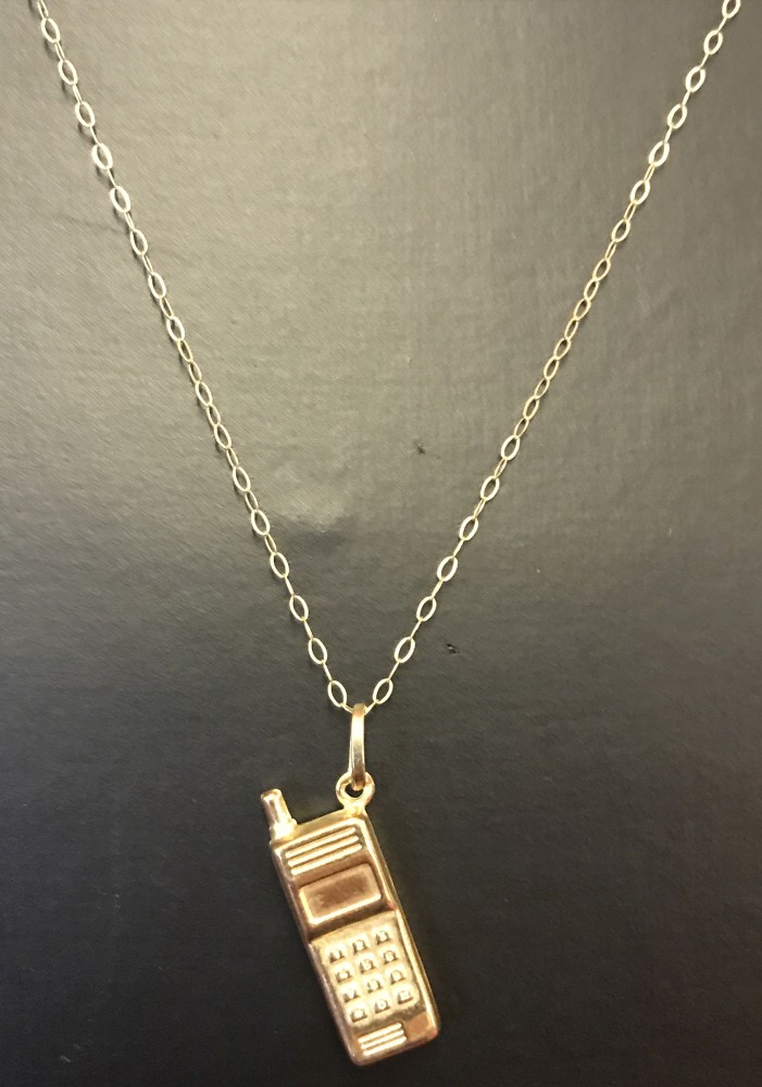 A 9ct yellow gold pendant in the shape of a mobile phone on a fine 9ct gold 18 inch chain.