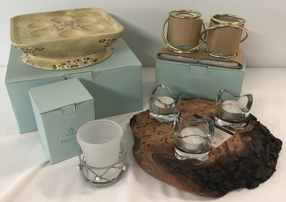 3 boxed items of Partylite interior candle holders.