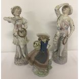 A group of 3 ceramic figurines comprising "Sweet Scent", a retired Lladro figure #5221.