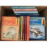 A box of 25 assorted vintage Haynes owners workshop manuals.