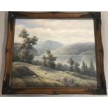 A framed oil on canvas of landscape scene depicting horned sheep to foreground by P. Wilson.