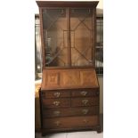 A Victorian mahogany 6 drawer bureau bookcase