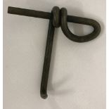 A WW1 style Mills Grenade ring puller.
