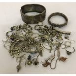 A bag of scrap silver and white metal jewellery, some items stone set.