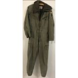 A khaki green German army flight suit complete with full length detachable fleece lining.