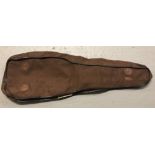 A brown canvas Leg 'O' Mutton gun case cover.