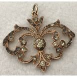 A vintage 9ct rose gold Art Nouveau design pendant set with clear stones.