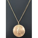 A 9ct gold round St Christopher pendant on a 24 inch curb chain.