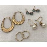 4 pairs of 9ct gold earrings.