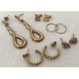 5 pairs of 9ct gold earrings in stud, hoop and drop designs.