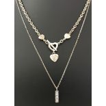 A 925 silver necklace with T bar fastening. Decorated with Rennie Mackintosh style hearts.