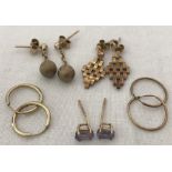 5 pairs of 9ct gold stud and drop earrings.