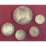 4 Victorian silver Indian coins together with a George V 1913 coin.