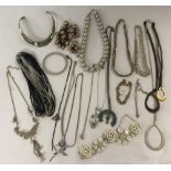 A small collection of vintage and modern costume jewellery.