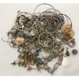 A small tub of mixed jewellery and jewellery findings to include natural stones and silver.