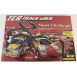 A new, boxed and sealed 1990, Buckingham Toys, TCR Track Lock; Super Challenge #3612-6.