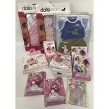 A box of new in original packing Baby Born clothes and accessories.