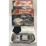 3 boxed vintage Radcon battery operated remote controlled Porsche 930 Turbo cars.