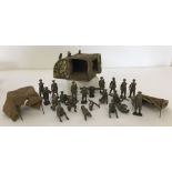 A collection of 19 Britains pre war British Infantry lead soldiers and assorted accessories.