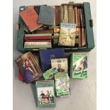 A collection of vintage books, mainly children's story books.