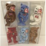 A collection of 6 cased Beanie Babies country bears by TY.