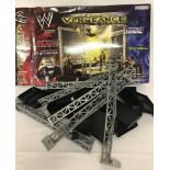 A boxed 2002 Jakks Pacific, WWE wrestling, Metal Vengeance Arena playset #W99040.