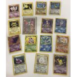 Collection of 15 rare and holo-rare Pokémon trading cards.