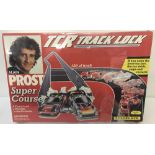 A new, boxed and sealed 1990, Buckingham Toys, TCR Track Lock; Alain Prost Super Course #3611-3.