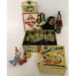 A box of mixed vintage toys.