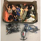 A box of assorted 1990's Hasbro Action Man dolls, clothes and accessories.